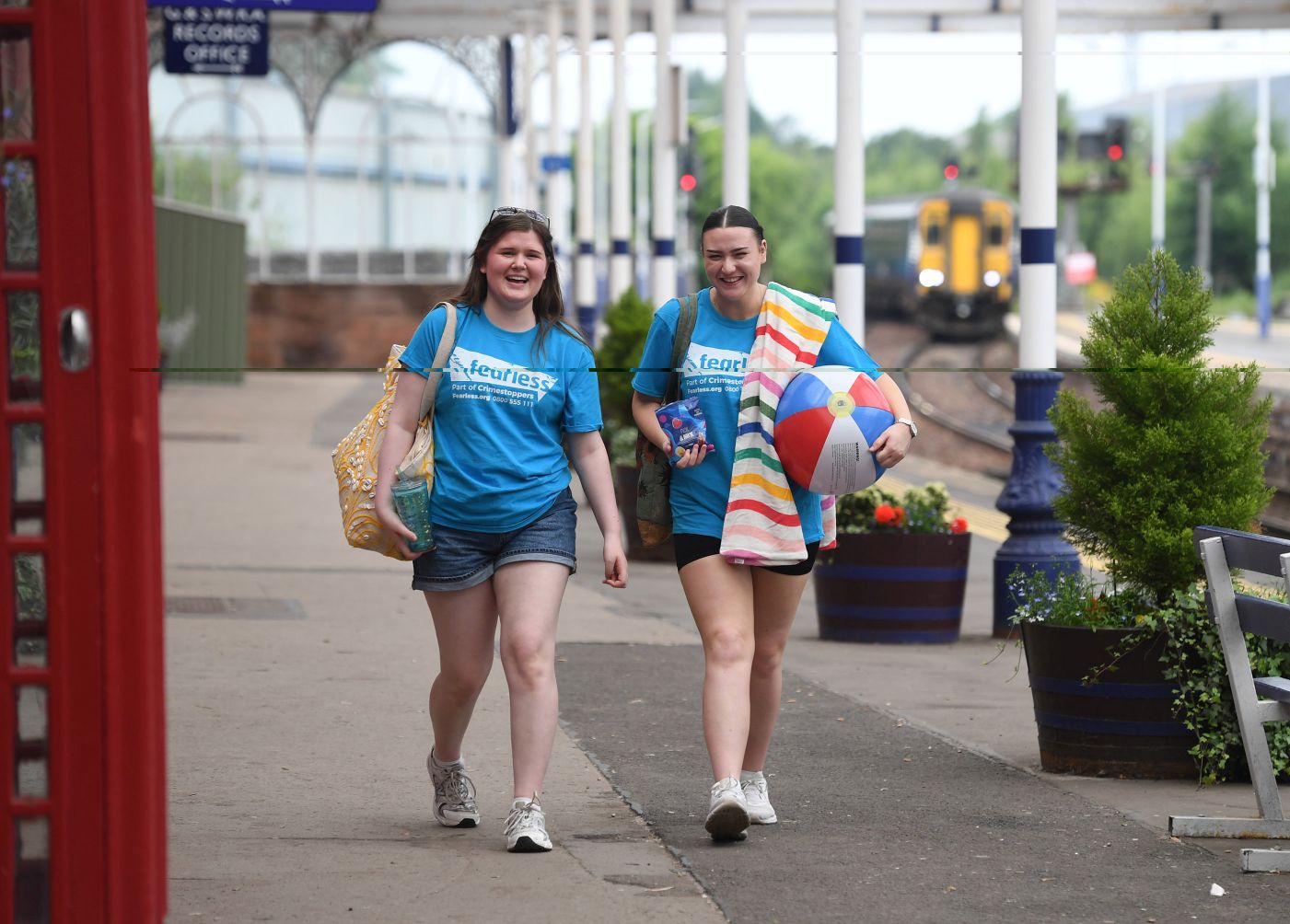 Young people at a railway station