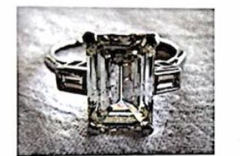 Emerald cut diamond ring