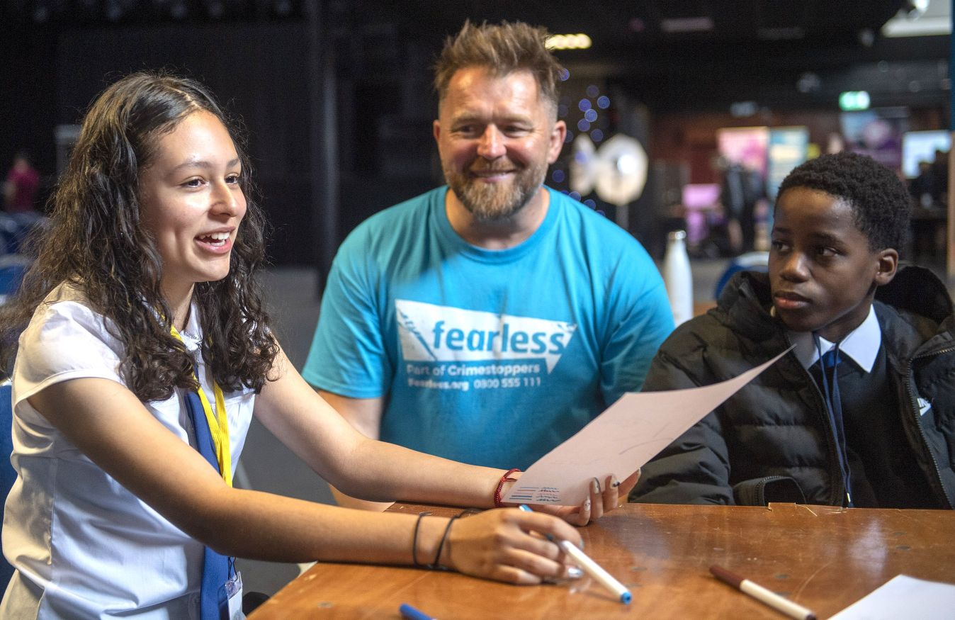 Senior Fearless Outreach Worker Donald Tumilowicz with two of the young people