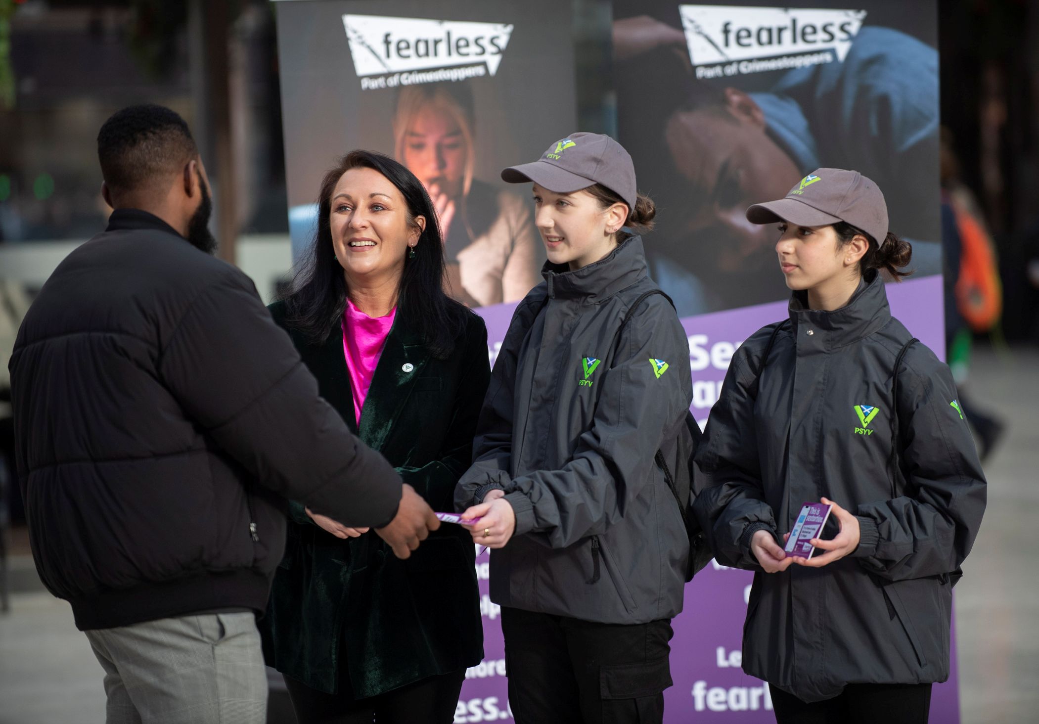 Minister for Victims and Community Safety Siobhian Brown with Police Scotland Youth Volunteers and representatives from Fearless