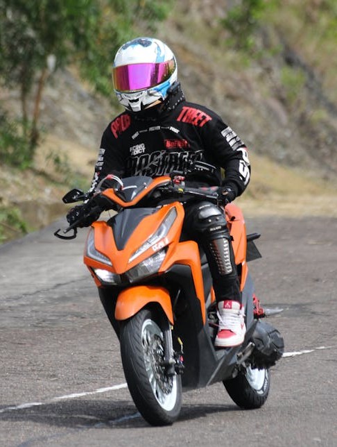 Person on fast motorbike