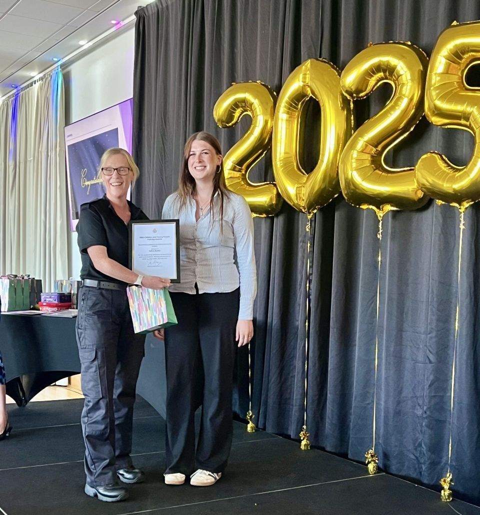 Saffron is presented with her award